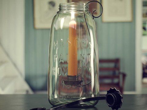 Modern glass bottle candle holder