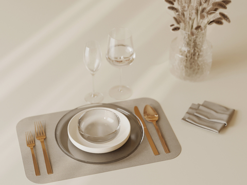 Modern dishes, knives and forks, wine glasses