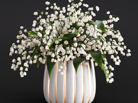 Modern lily of the valley vase floral arrangement