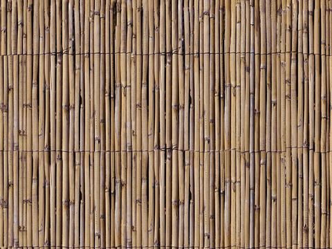 Seamless yellow distressed bamboo pole bamboo fence