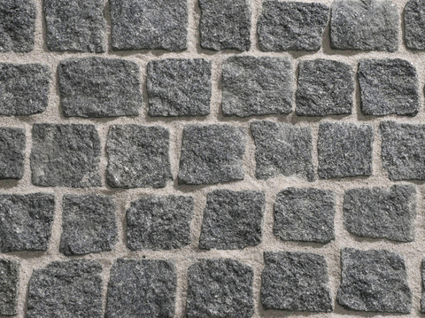 Black granite stone wall