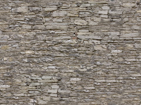 Seamless old damaged outdoor building rock stone wall brick wall