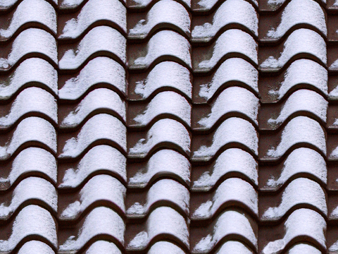 Seamless villa building snow covered roof tiles