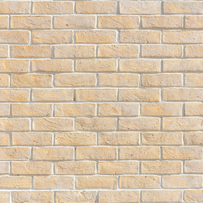 light yellow brick wall staggered wall