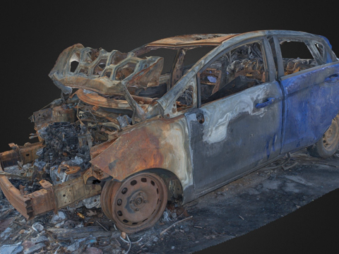 Burned Ford wreckage